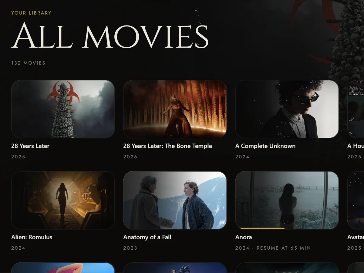 The native player's film library, with landscape artwork and a film to continue watching, on a sample library.